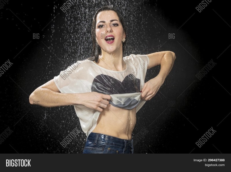 The woman takes off his T -shirt