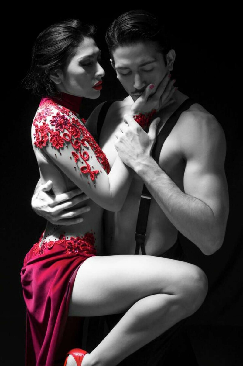 Man and woman in red