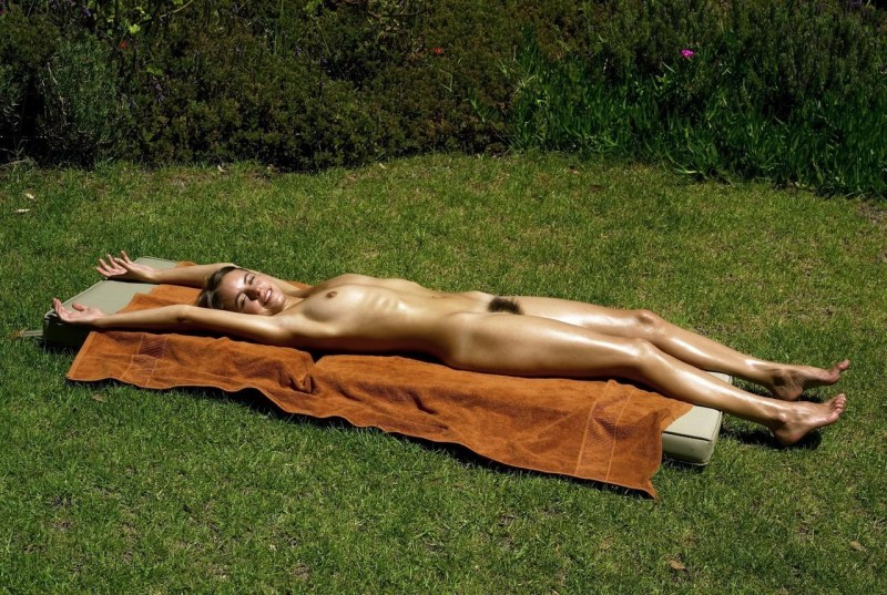 Girls sunbathe in the country