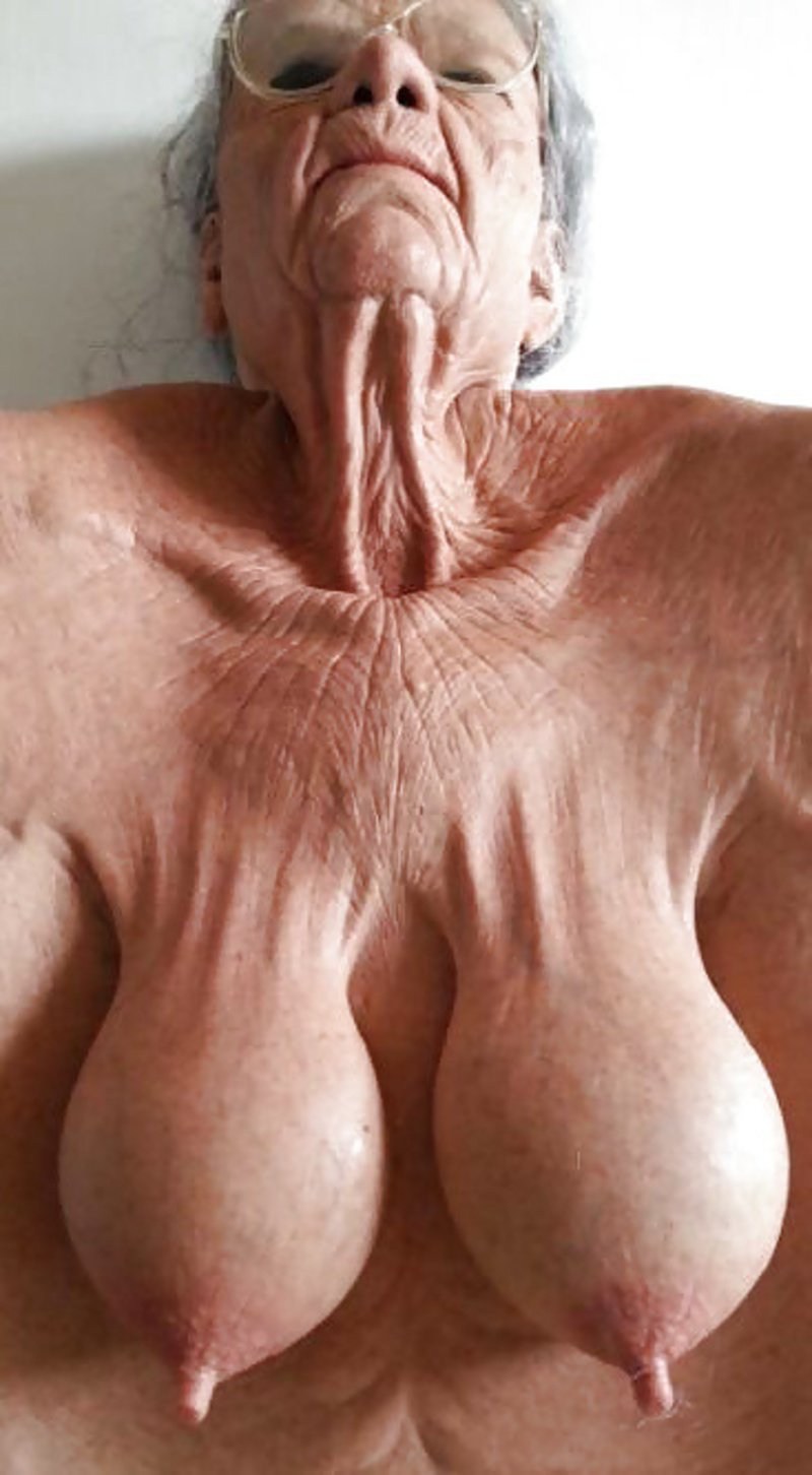 Older women with naked breasts