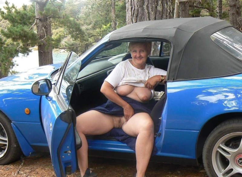 Naked fat woman in a car
