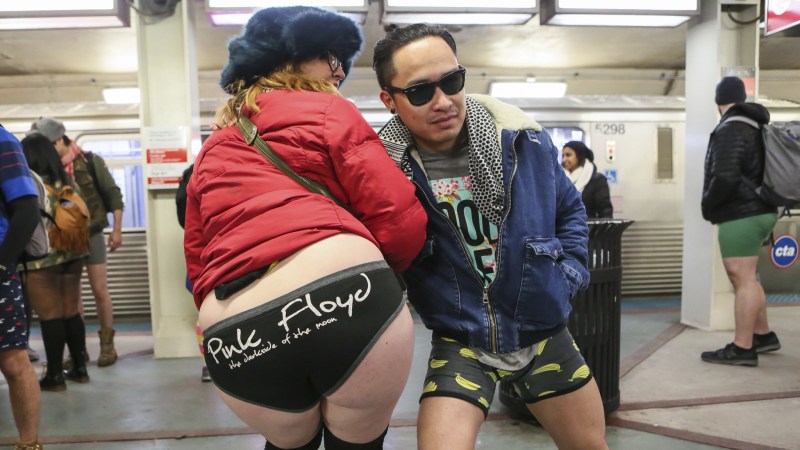 Tights under the skirt in the subway