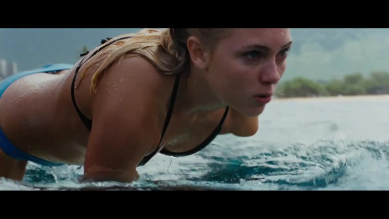 Annasophy Robb as a child in a swimsuit