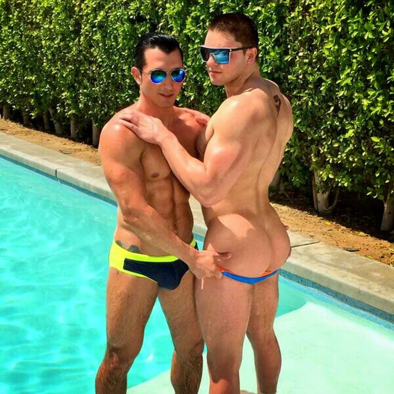 Guys fuck in the pool