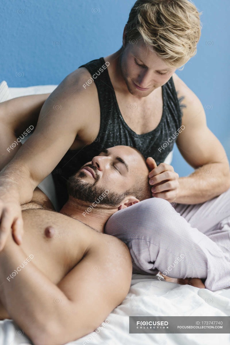 Homosexual couple in bed