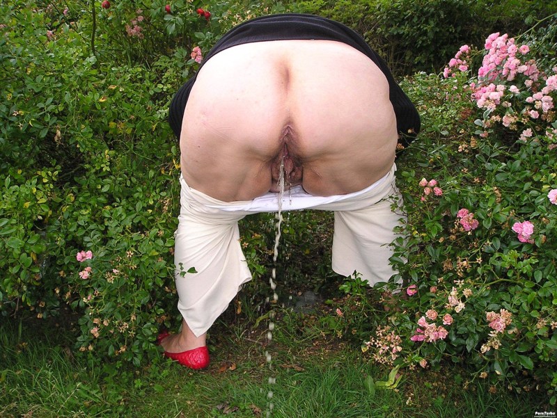 Grandma in the garden without panties