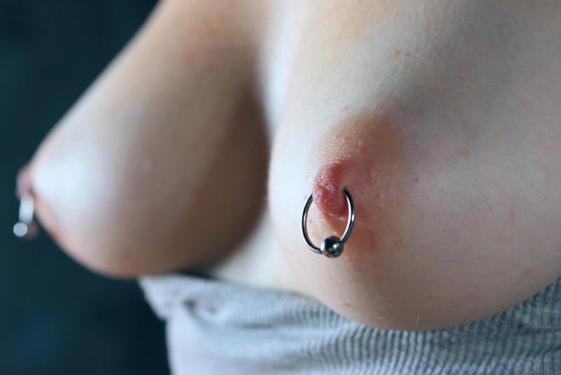 Breasts with pierced nipples