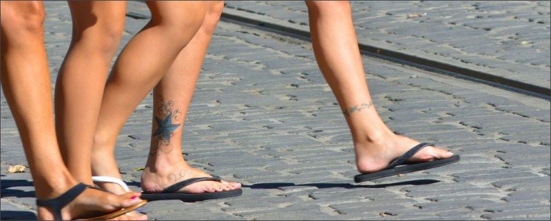 Women's bare feet tattoo