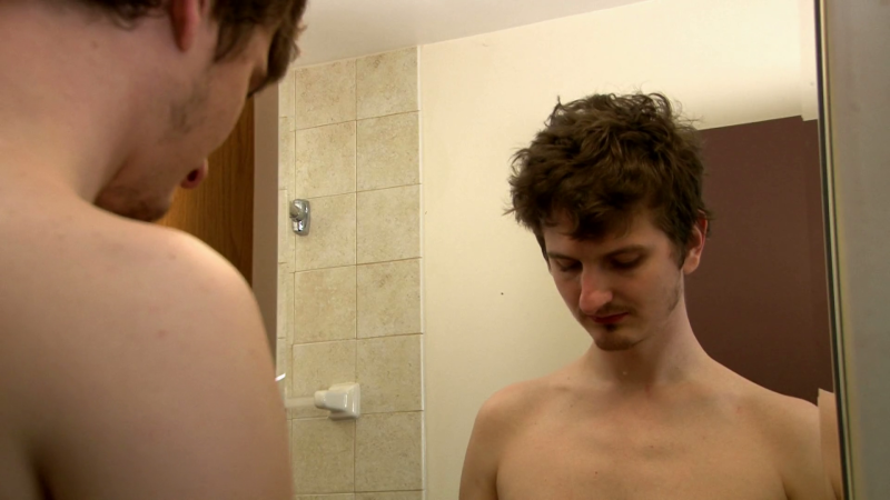 Naked women in front of the mirror