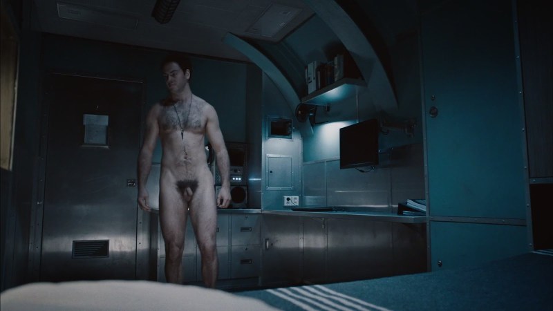 Naked guy in front of the mirror