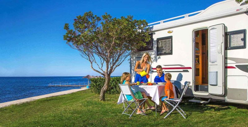 In a bikini in a camp