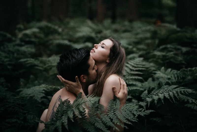 Naked men and women in nature