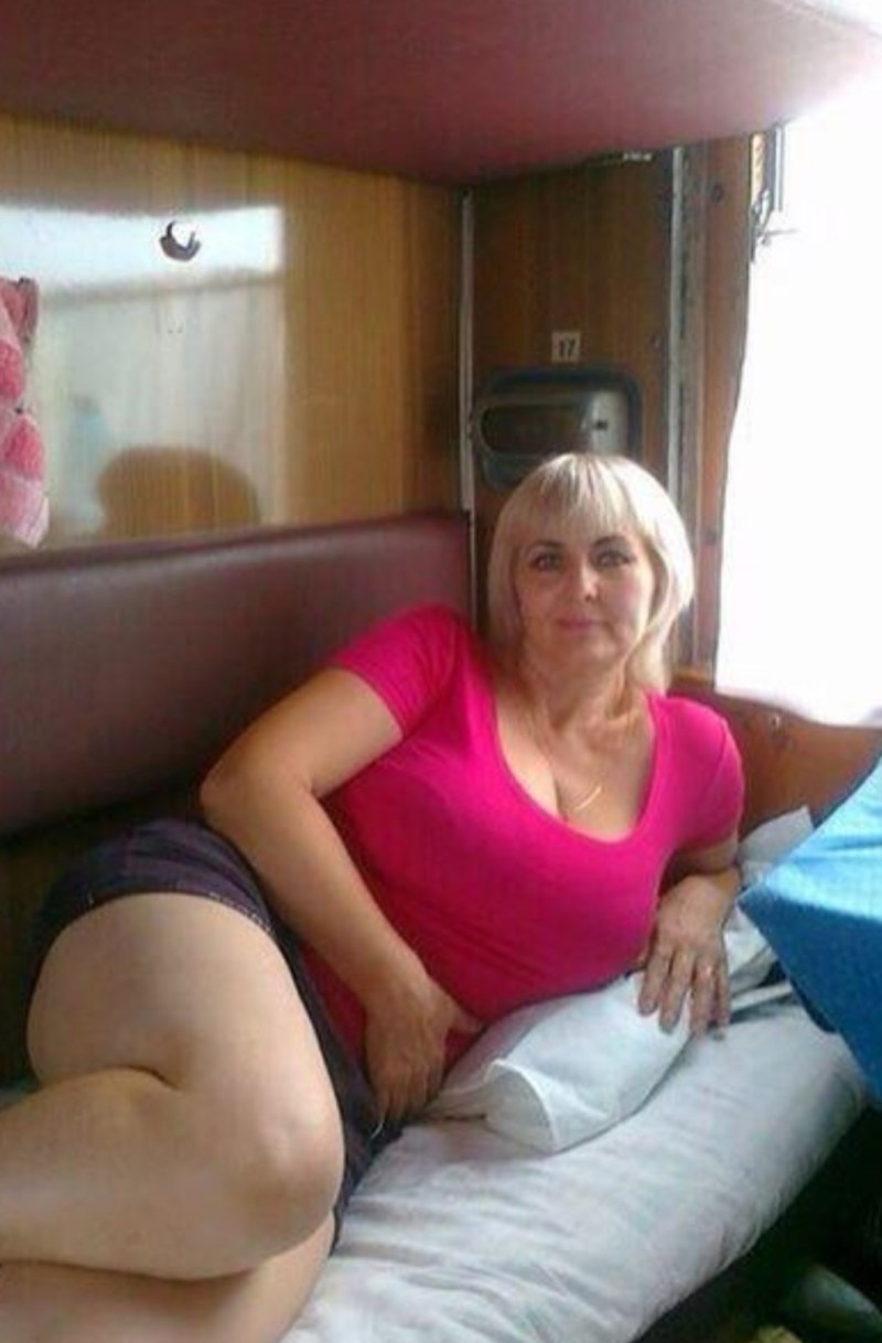 The girl undresses on the train