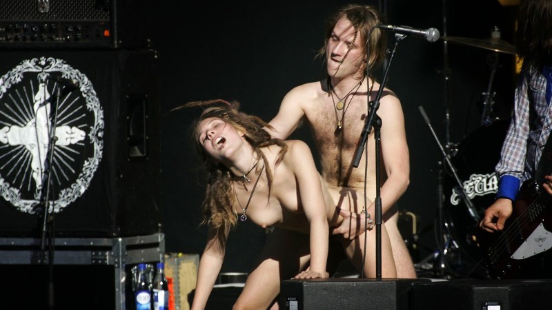 Naked rock singer on stage