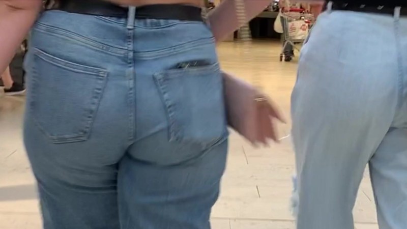 Naked butt in torn jeans