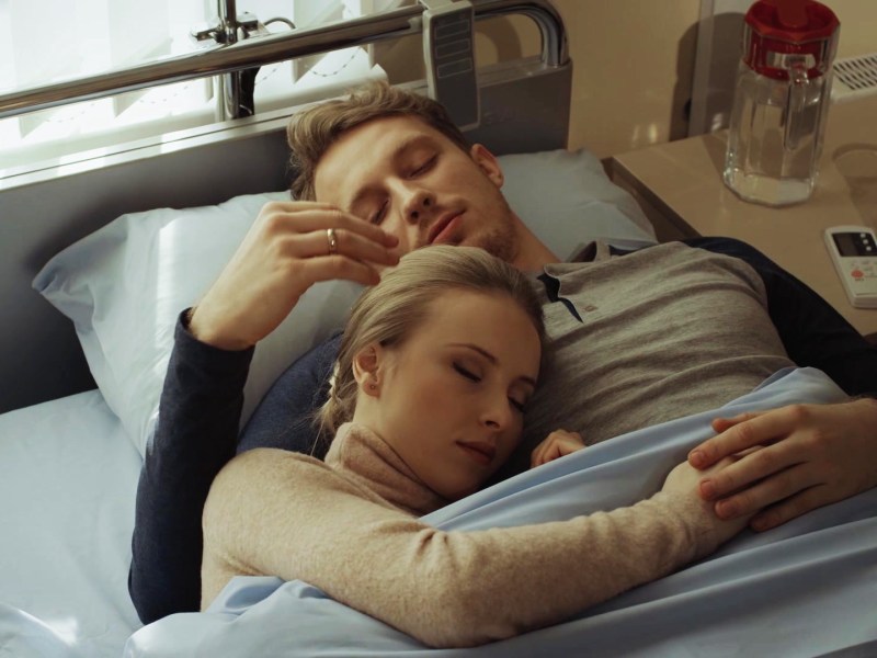 Irina Dubtsova with her son in the pool