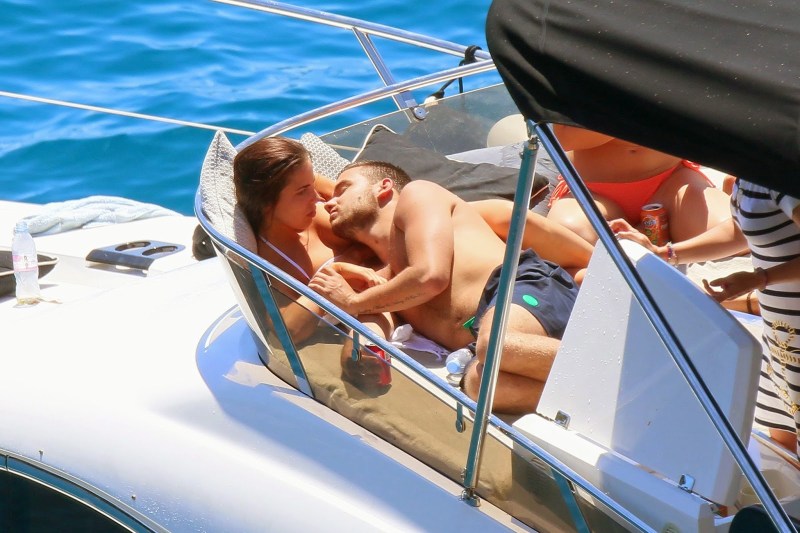 A guy with a girl at sea