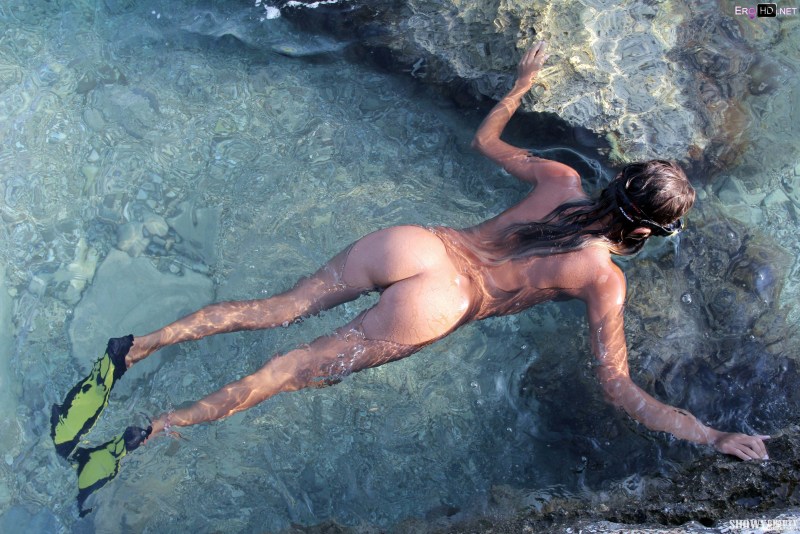 Naked girls jump into the water