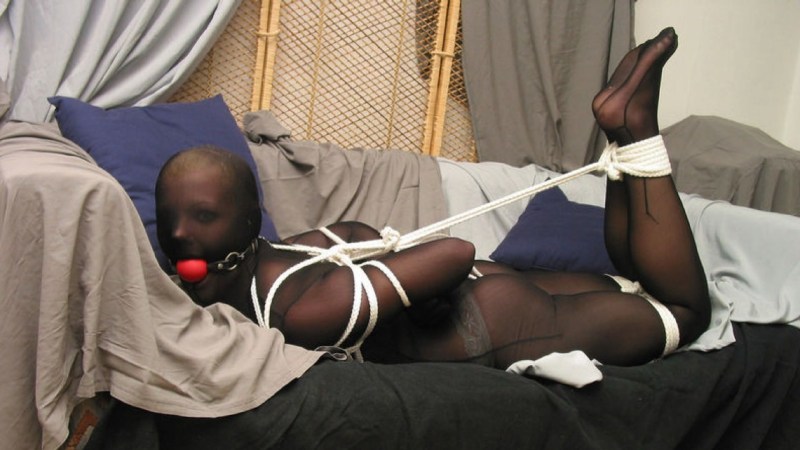 Black women associated in pantyhose BDSM