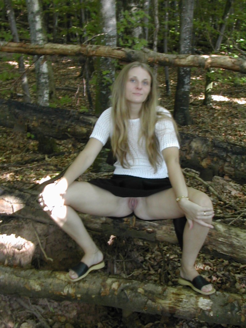 Girl Touches Her Hairy Pussy in the Woods