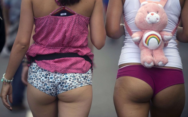 Asses of girls in shorts on the street