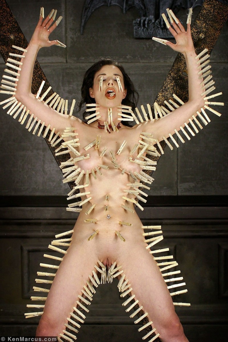 Piercing the clitoris of BDSM