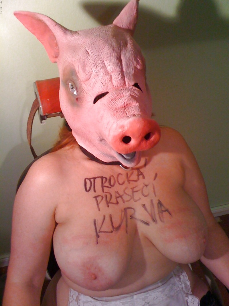 Naked in a costume of pigs