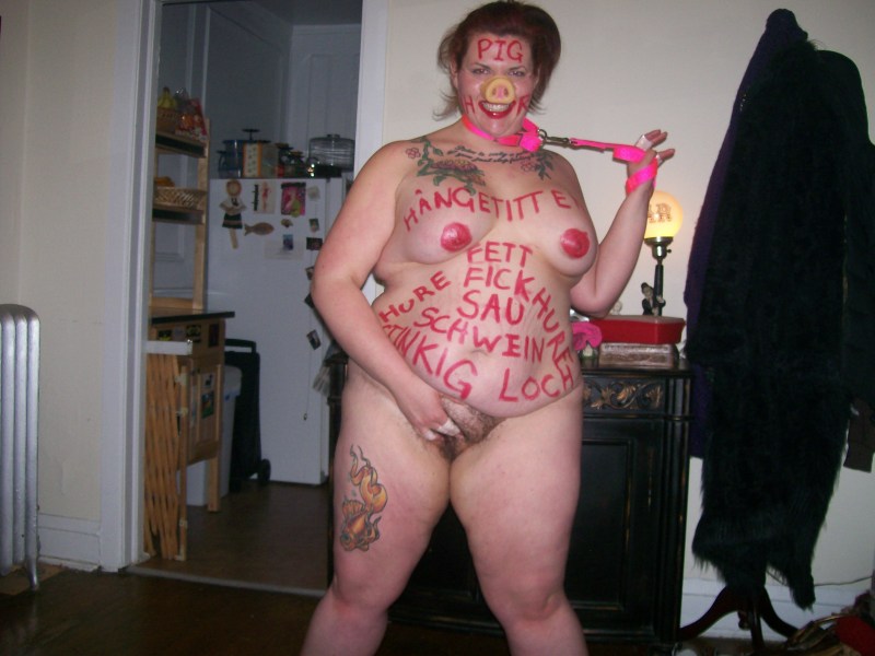 Fat naked in a pig's mask
