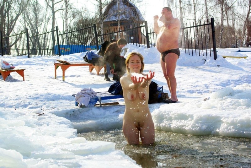 Family bathing naked in winter