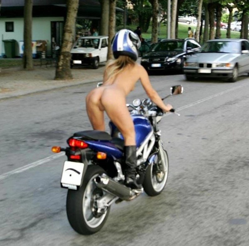 Girls without panties on a motorcycle