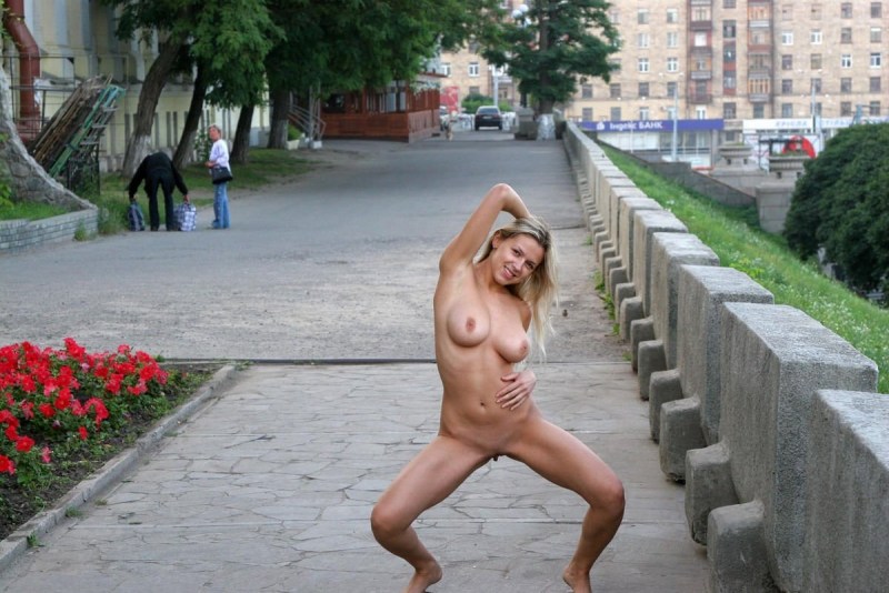 Naked woman walks down the street