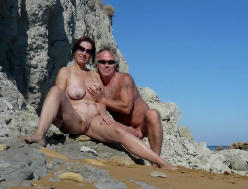 Elderly married couples on the beach nude