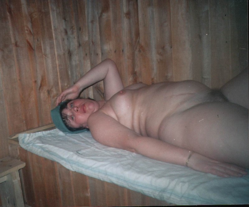 Fat woman in a village bath