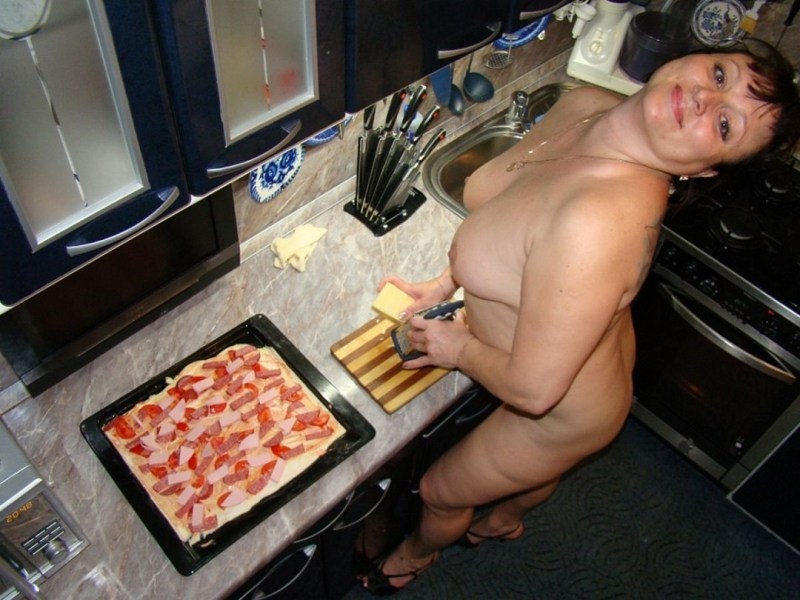 Naked fat wife in the kitchen