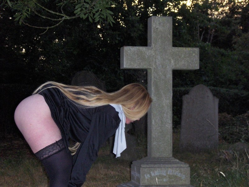 Naked photo shoot in the cemetery