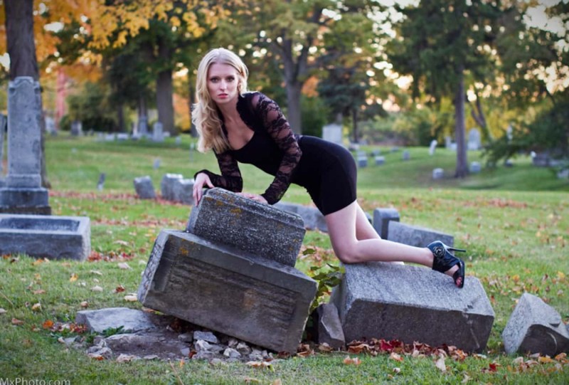Beautiful girl in a cemetery