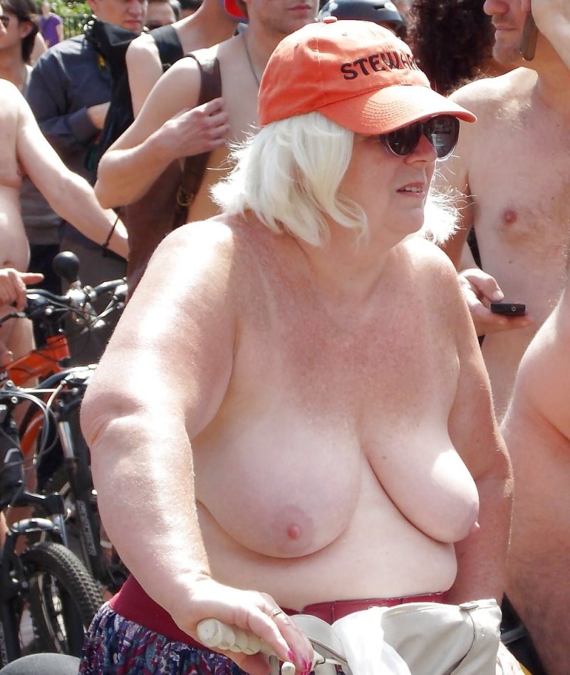 An elderly lady lit her chest