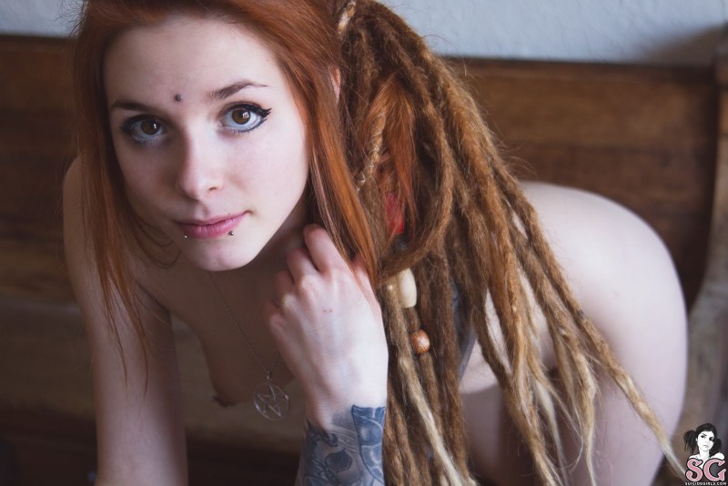 Dreadlocks red blue -eyed naked