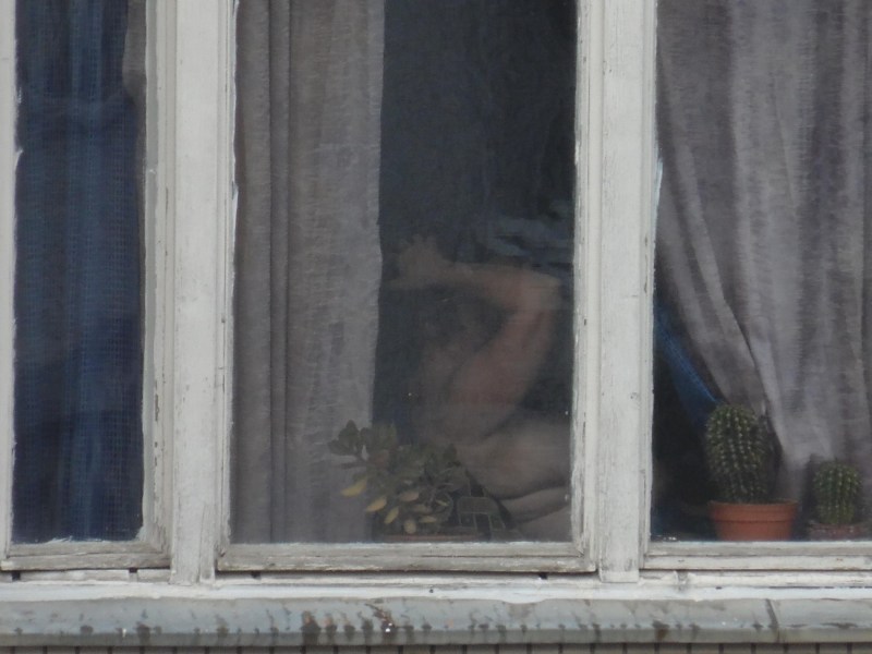 Girl in the window opposite