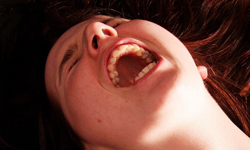 The face of a woman with orgasm