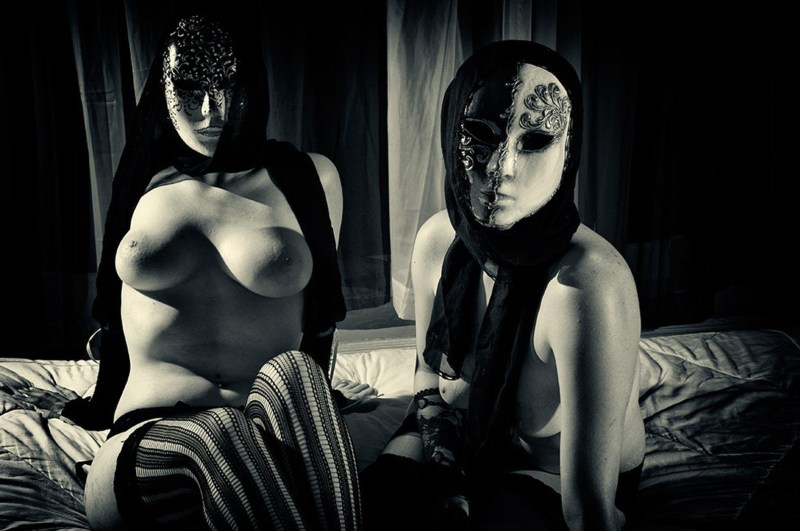 Girl in an erotic mask