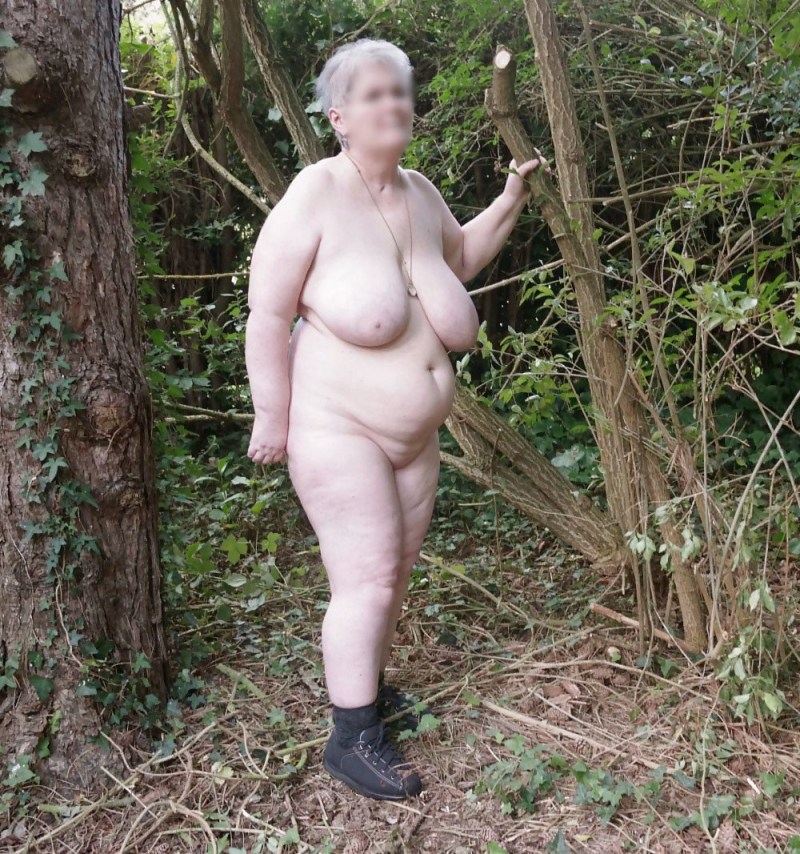 Naked old women in nature