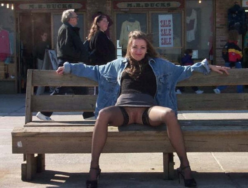 Girl on a bench without panties