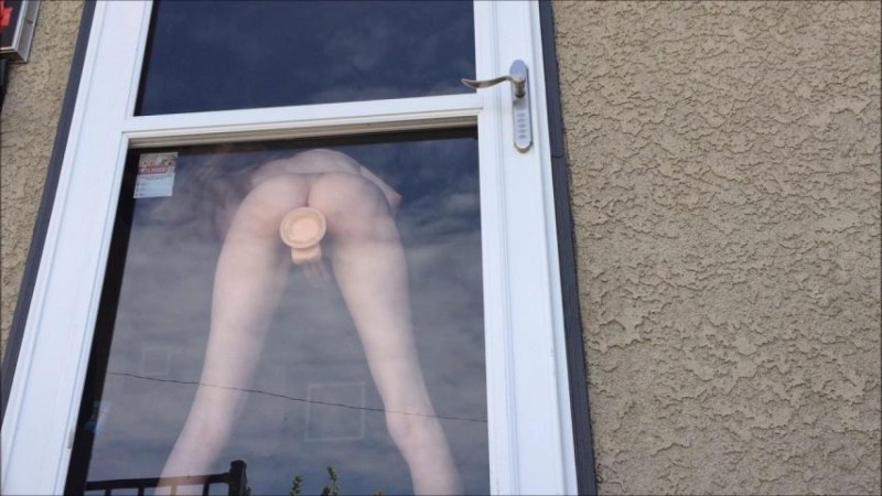 Naked exhibitionist in the window