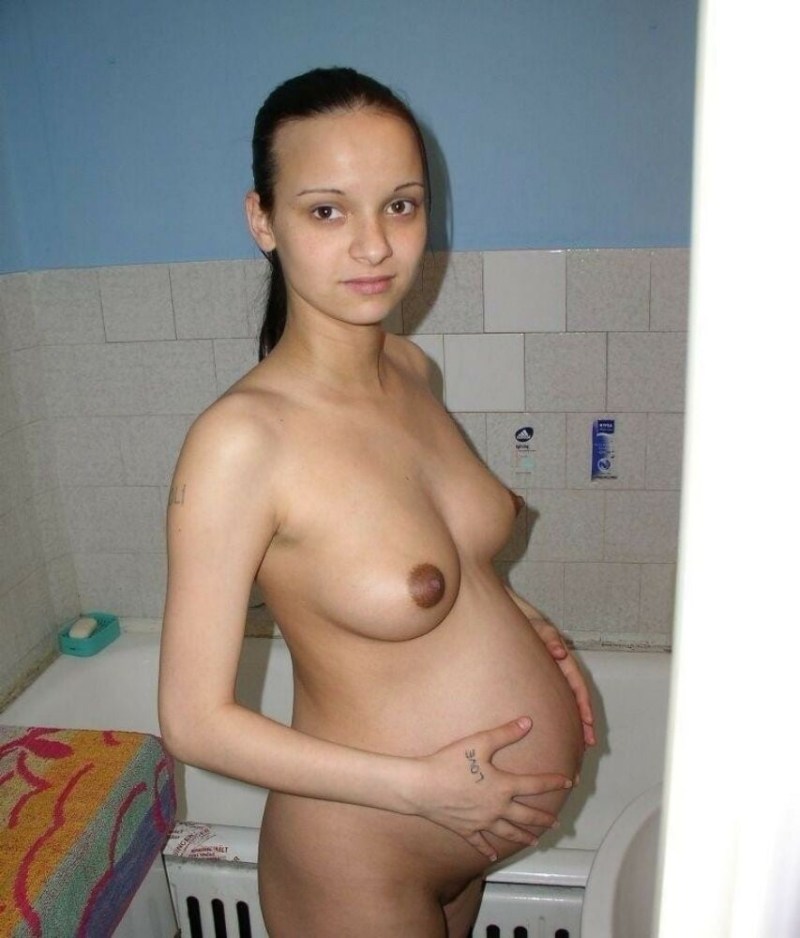 Young pregnant naked