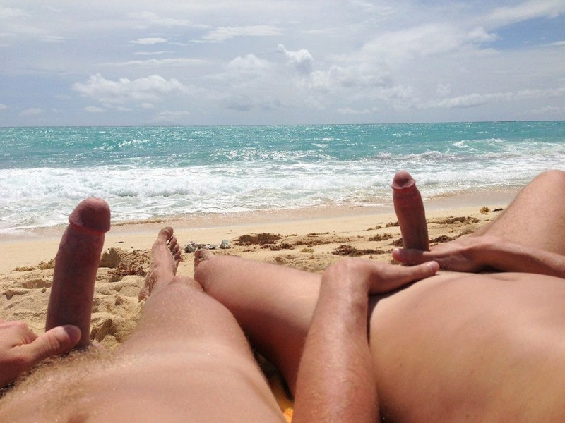 Male handjob on the beach