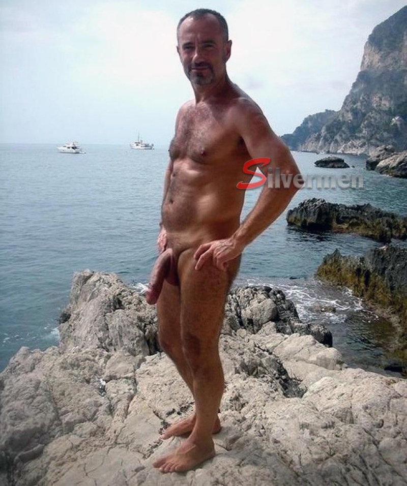 Naked man on the beach private