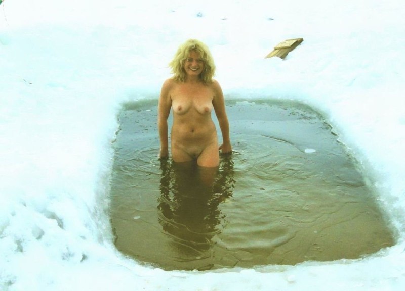Naked women bathe in the hole