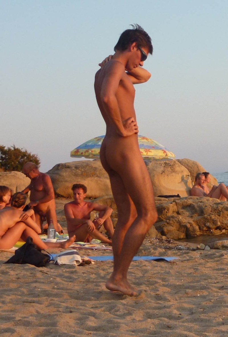 Naked men on a public beach