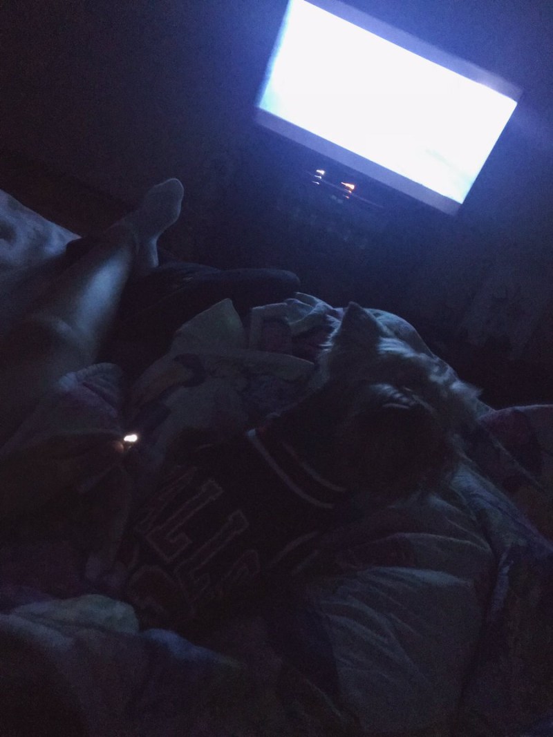 The guy on the bed in the dark